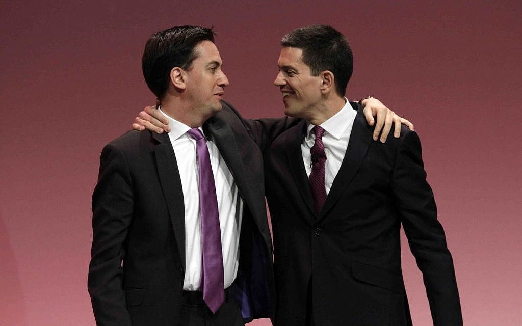 In this Monday, Sept. 27, 2010, file photo, Ed Miliband, left, the then newly-elected leader of Britain's opposition Labour Party, embraces his brother David Miliband, right, following David's speech on foreign policy during the party's annual conference, in Manchester, England. (photo credit: AP/Lefteris Pitarakis) In this Monday, Sept. 27, 2010, file photo, Ed Miliband, left, the then newly-elected leader of Britain's opposition Labour Party, embraces his brother David Miliband, right, following David's speech on foreign policy during the party's annual conference, in Manchester, England. (photo credit: AP/Lefteris Pitarakis)