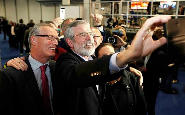 Sinn Fein President Gerry Adams, right, and Sinn Fein candidate for North Belfast Gerry Kelly take a selfie at the Kings Hall count center, Northern Ireland, Friday, May 8, 2015. (AP Photo/Peter Morrison) Sinn Fein President Gerry Adams, right, and Sinn Fein candidate for North Belfast Gerry Kelly take a selfie at the Kings Hall count center, Northern Ireland, Friday, May 8, 2015. (AP Photo/Peter Morrison)