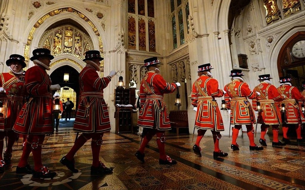 Yeoman of the Guard pass through the Peer's Lobby during the ceremonial search ahead of the State Opening of Parliament, in the House of Lords at the Palace of Westminster in London Wednesday May 27, 2015. (John Stillwell/AP) Yeoman of the Guard pass through the Peer's Lobby during the ceremonial search ahead of the State Opening of Parliament, in the House of Lords at the Palace of Westminster in London Wednesday May 27, 2015. (John Stillwell/AP)