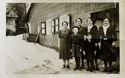 This undated photo provided by Paul Schmitz, a son of a United States WWII soldier, shows him as a little boy with his mother, right, and aunts. Schmitz talked to The Associated Press about his father and his life in post WWII Germany. (Photo credit: Courtesy of Paul Schmitz via AP)