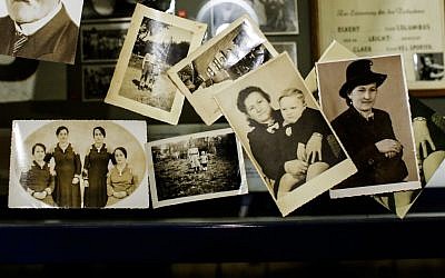 The March 18, 2015 photo shows several undated family photos provided by Paul Schmitz, a son of a United States WWII soldier, showing him as a little boy with his mother, center right picture. Paul Schmitz talked to The Associated Press about his father and his life in post WWII Germany during an interview at the Allied Museum in Berlin. (Photo credit: AP)