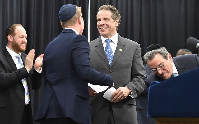 New York Gov. Andrew Cuomo speaks at a rally at Yeshiva Shaare Torah in Brooklyn in support of the Parental Choice in Education Act, May 17, 2015. (NYS Governor's Office/Kevin P. Coughlin/ via JTA) New York Gov. Andrew Cuomo speaks at a rally at Yeshiva Shaare Torah in Brooklyn in support of the Parental Choice in Education Act, May 17, 2015. (NYS Governor's Office/Kevin P. Coughlin/ via JTA)