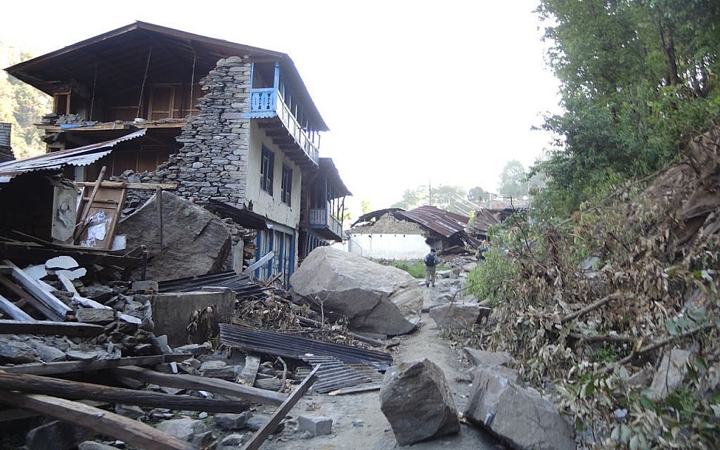 Enormous boulders that crashed down in a rockslide demolished homes in the village of Topani, in the hard-hit Sidhulpalchowk district, seven hours away from Kathmandu, May 2015. (photo credit: Melanie Lidman / Times of Israel)