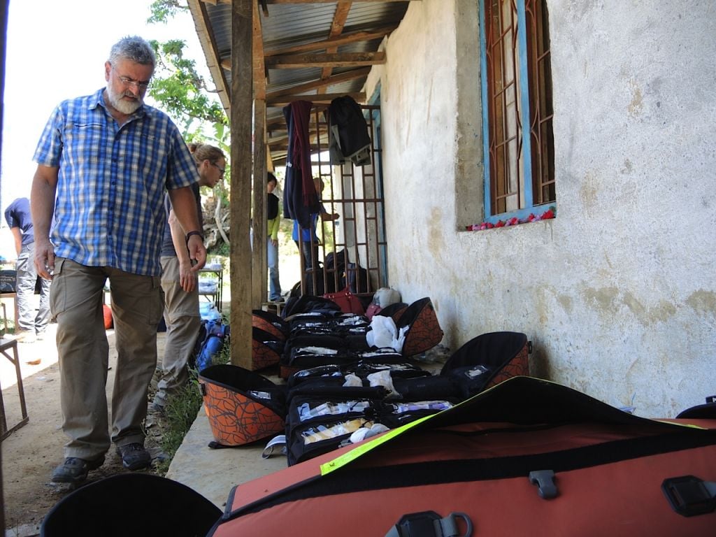 Dr Amir Korngreen of Soroka University Medical Center looks over the backpacks holding IsraAID’s mobile clinic before they start treating patients. (Photo credit: Melanie Lidman/Times of Israel) Dr Amir Korngreen of Soroka University Medical Center looks over the backpacks holding IsraAID’s mobile clinic on May 3, 2015 before they start treating patients. (Photo credit: Melanie Lidman/Times of Israel)
