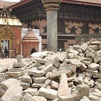 The rubble of a temple called Vatsala Durga in the old city of Bhaktapur near Kathmandu after the first earthquake. The 16th Century Vatsala Durga temple was famous for its sandstone walls and gold-topped pagodas. A few of the buildings in the square did survive the earthquake. (Melanie Lidman/Times of Israel)