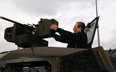 Defence minister Ehud Barak inspects a tank during a visit to the IDFs Northern Command, January 12, 2010. Photo by Michal Shalev/Ministry of Defence/FLASH90) Defence minister Ehud Barak inspects a tank during a visit to the IDFs Northern Command, January 12, 2010. Photo by Michal Shalev/Ministry of Defence/FLASH90)