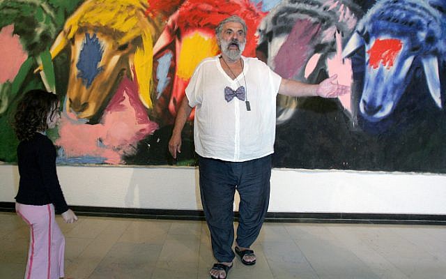 Menashe Kadishman in the Tel Aviv Museum next to some of his iconic sheep on May 15, 2007. (photo credit: Moshe Shai/Flash90) Menashe Kadishman in the Tel Aviv Museum next to some of his iconic sheep on May 15, 2007. (photo credit: Moshe Shai/Flash90)