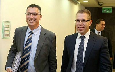 Then-minister of interior Gideon Sa'ar (L) and then-minister of communications Gilad Erdan arrive at the weekly cabinet meeting in Jerusalem, April 06, 2014. (Amit Shabi/Pool/Flash90) Then-minister of interior Gideon Sa'ar (L) and then-minister of communications Gilad Erdan arrive at the weekly cabinet meeting in Jerusalem, April 06, 2014. (Amit Shabi/Pool/Flash90)