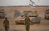 Israeli soldiers seen at a deployment area near the border with the Gaza Strip on August 25, 2014 (Yonatan Sindel/Flash90)