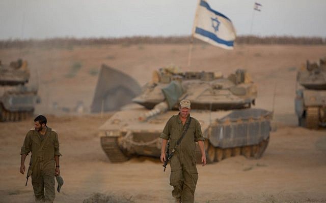 Israeli soldiers seen at a deployment area near the border with the Gaza Strip on August 25, 2014 (Yonatan Sindel/Flash90) Israeli soldiers seen at a deployment area near the border with the Gaza Strip on August 25, 2014 (Yonatan Sindel/Flash90)