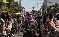 Palestinian Islamic Jihad supporters celebrate what they said was a victory over Israel in Gaza City, August 29, 2014 (Emad Nassar/Flash90)