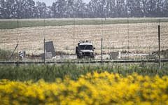 An IDF vehicle in Absan, near the border between Israel and east of the town of Khan Yunis in the southern Gaza Strip, March 30, 2015 (Abed Rahim Khatib/Flash90)