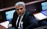 Yesh Atid party leader Yair Lapid seen during a swearing in ceremony for the 20th Knesset on March 31, 2015 (Miriam Alster/Flash90)