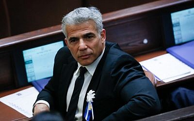 Yesh Atid party leader Yair Lapid seen during a swearing in ceremony for the 20th Knesset on March 31, 2015 (Miriam Alster/Flash90)
