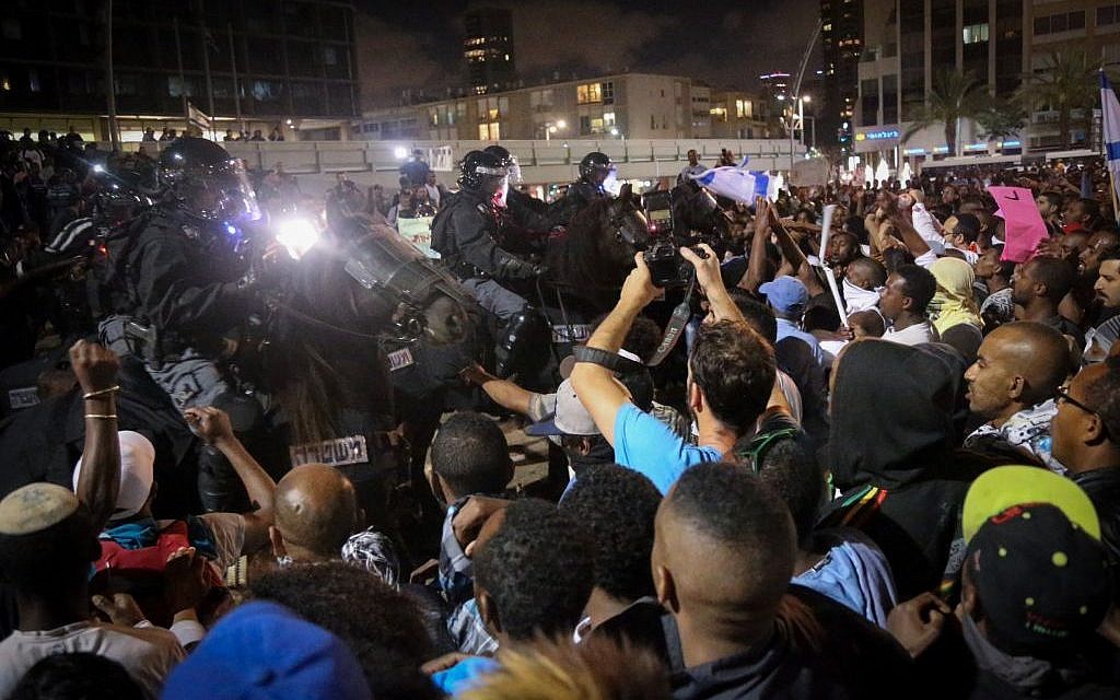 Police on horseback attempt to break up a protest in Tel Aviv on May 3, 2015. (photo credit: Flash90)