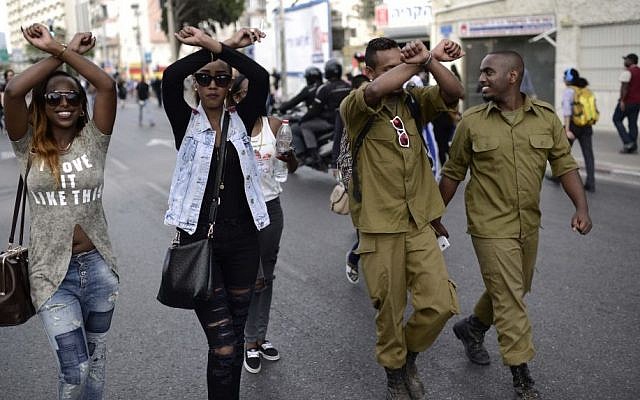 Thousands of Israeli-Ethiopians protest on the Ayalon Highway in Tel Aviv against violence and racism directed at Israelis of Ethiopian descent, May 03, 2015. (photo credit: Tomer Neuberg/FLASH90) 