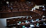 A smattering of MKs in the Knesset plenum on May 4, 2015. (photo credit: Miriam Alster/Flash90)