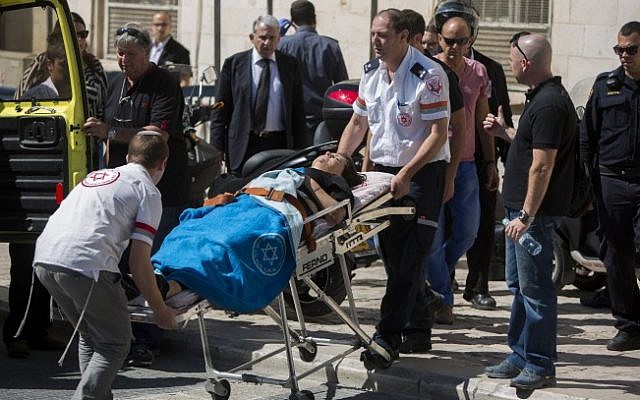 Israeli attorney Ruth David, connected to the court case on Israeli attorney Ronel Fisher is taken by paramedics into an ambulance outside the Magistrate's court in Jerusalem on May 08, 2015. (Photo credit: Yonatan Sindel/Flash90) Israeli attorney Ruth David, connected to the court case on Israeli attorney Ronel Fisher is taken by paramedics into an ambulance outside the Magistrate's court in Jerusalem on May 08, 2015. (Photo credit: Yonatan Sindel/Flash90)