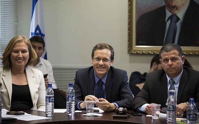 MK Tzipi Livni (L) MK Isaac Herzog (C) and MK Eitan Cabel (R) of the Zionist Camp party seen during a party meeting at the Knesset, Jerusalem, May 11, 2015. (photo credit: Hadas Parush/Flash90) 