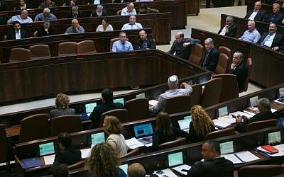 Members of Knesset seen during a plenum session on expanding the number of ministers in the new forming government, on May 11, 2015. (Photo credit: Miriam Alster/Flash90)