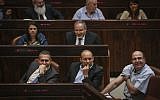 Gilad Erdan, left, Naftali Bennett, center, and Moshe Ya'alon in the Knesset plenum on May 13, 2015. (photo credit: Hadas Parush/Flash90)