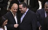 Incoming coalition chairman Tzachi Hanegbi (L) and Transportation and Intelligence Minister Israel Katz (R) at a Knesset ceremony swearing in the new government on May 14, 2015 (Knesset Spokesperson)
