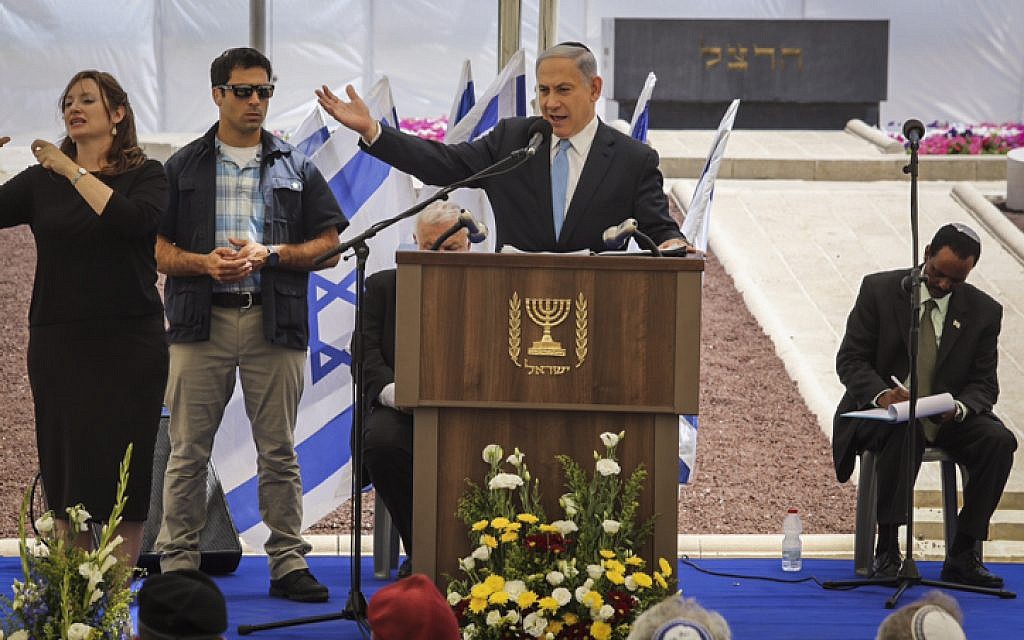 Prime Minister Benjamin Netanyahu speaks during a memorial ceremony in remembrance of Jewish Ethiopians who fell on their trip from Ethiopian to Israel, on Mount Herzl, May 17, 2015. (Gil Yochanan/POOL)