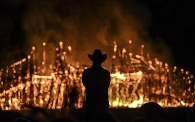 The Temple of One burns on the last night of the Israeli Burning Man festival, Midburn, in the desert near Sde Boker, May 24, 2015. (Ben Kelmer/Flash90)