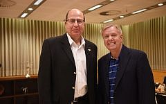 Israeli Minister of Defense Moshe Ya'alon meets with US Senator Lindsey Graham on May 27, 2015. (Photo by Diana Hananshvili/Ministry of Defense)