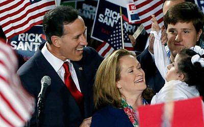 Former US Senator Rick Santorum, left, and his wife Karen, center, talk with his daughter Bella, right, as he announces his candidacy for the Republican nomination for President of the United States in the 2016 election on Wednesday, May 27, 2015 in Cabot, Pennsylvania. (AP Photo/Keith Srakocic)
