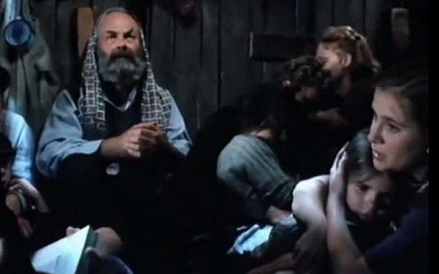 Image from the 1996 film 'Hidden in Silence,' based on the true life events of the 13-member Diamant family who were hid in the attic of two Polish orphans during the Holocaust (screen capture: YouTube)
