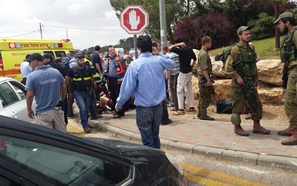 The scene of a suspected car-ramming terror attack May 14, 2015 outside the West Bank settlement of Alon Shvut. (Courtesy Zaka) The scene of a suspected car-ramming terror attack May 14, 2015 outside the West Bank settlement of Alon Shvut. (Courtesy Zaka)