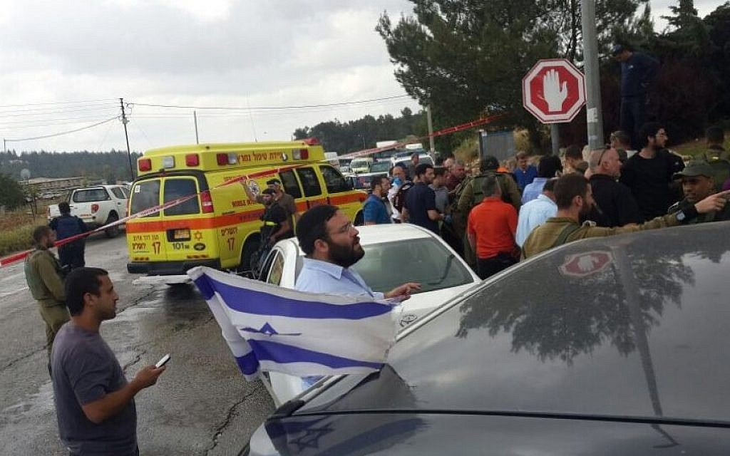 The scene of a suspected terror attack near the West Bank settlement of Alon Shvut, in which three teenagers were wounded when a Palestinian driver slammed into a hitchhiking post, May 14, 2015. (Courtesy Zaka) The scene of a suspected terror attack near the West Bank settlement of Alon Shvut, in which three teenagers were wounded when a Palestinian driver slammed into a hitchhiking post, May 14, 2015. (Courtesy Zaka)