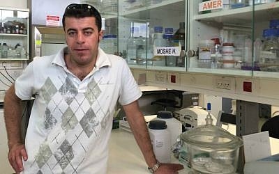 Amer Sweity in his lab at Ben-Gurion University of the Negev's campus in Sde Boker, Israel, May 18, 2015. (Renee Ghert-Zand/Times of Israel)