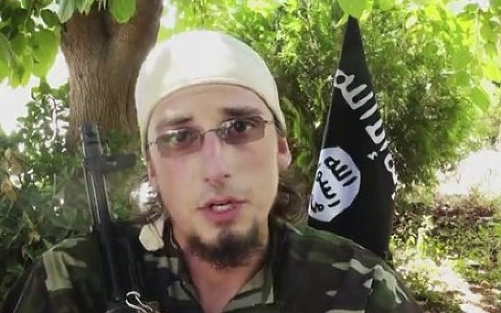 An undated image made from a video released by Islamic State militants appears to show Andre Poulin, a Canadian enlistee in the Islamic State group, speaking in a video that has been used for online recruitment (Militant video via AP) An undated image made from a video released by Islamic State militants appears to show Andre Poulin, a Canadian enlistee in the Islamic State group, speaking in a video that has been used for online recruitment (Militant video via AP)