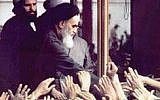 Ayatollah Ruhollah Khomeini greets followers in Iran. (Wikimedia/public domain)