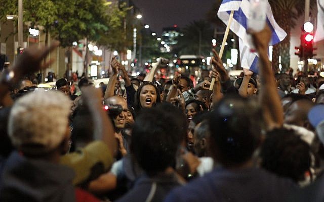 Ethiopian Israelis march in an anti-police brutality demonstration in Tel Aviv's Rabin Square on Sunday, May 3, 2015. (photo credit: Judah Ari Gross/Times of Israel staff) Ethiopian Israelis march in an anti-police brutality demonstration in Tel Aviv's Rabin Square on Sunday, May 3, 2015. (photo credit: Judah Ari Gross/Times of Israel staff)