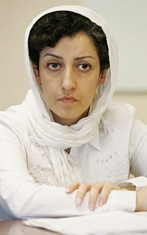 In this Monday, June 9, 2008 file photo, Iranian Narges Mohammadi, delegate of the Center for Human Rights Defenders, listens to a question during a press conference on the Assessment of the Human Rights Situation in Iran, at the U.N. headquarters in Geneva, Switzerland. (photo credit: Magali Girardin/Keystone via AP, File)