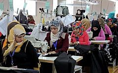 In this Wednesday, May 20, 2015 photo, Jordanian women sew jeans for the U.S. market in a garment factory in the village of Kitteh in northern Jordan. However, for millions of young people in the Middle East and North Africa unemployment has only worsened in the post-Arab Spring turmoil. (AP Photo credit: AP/Raad Adayleh)