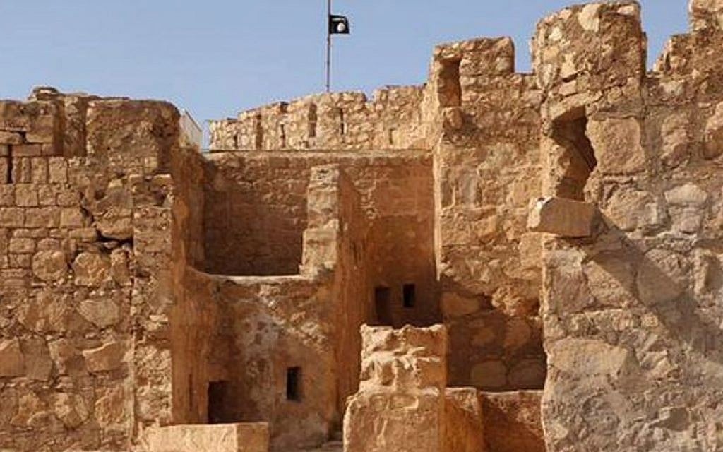 The Islamic State flag raised on top of Palmyra castle, May 22, 2015. (The website of Islamic State fighters via AP) The Islamic State flag raised on top of Palmyra castle, May 22, 2015. (The website of Islamic State fighters via AP)