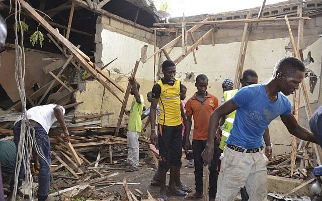 Rescue workers gather at the site of an explosion in Maiduguri, Nigeria, May 30, 2015. (AP/Jossy Ola) Rescue workers gather at the site of an explosion in Maiduguri, Nigeria, May 30, 2015. (AP/Jossy Ola)