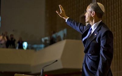 President Barack Obama, wearing a traditional Jewish yarmulke, waves after speaking at Adas Israel Congregation in Washington, Friday May 22, 2015. (AP Photo/Pablo Martinez Monsivais)