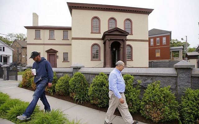 In this Thursday, May 28, 2015 photo, employees Chuck Flippo, right, and Asa Montgomery walk through Patriots Park at the Touro Synagogue, the nation's oldest, in Newport, Rhode Island. (AP Photo/Stephan Savoia) In this Thursday, May 28, 2015 photo, employees Chuck Flippo, right, and Asa Montgomery walk through Patriots Park at the Touro Synagogue, the nation's oldest, in Newport, Rhode Island. (AP/Stephan Savoia)