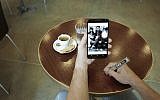Writing on a table surface to input data onto a smartphone? Phree can do that (Photo credit: Courtesy)