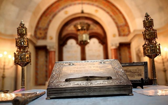 In this photo taken on Tuesday, May 5, 2015, Jewish ceremonial objects rest in the Jewish synagogue in Lisbon. Portugal enacted in March a law to grant citizenship to descendants of Sephardic Jews exiled during the Inquisition 500 years ago. Spain is about to adopt a similar law but its different requirements have raised criticism. (photo credit: AP Photo/Francisco Seco) In this photo taken on Tuesday, May 5, 2015, Jewish ceremonial objects rest in the Jewish synagogue in Lisbon. Portugal enacted in March a law to grant citizenship to descendants of Sephardic Jews exiled during the Inquisition 500 years ago. Spain is about to adopt a similar law but its different requirements have raised criticism. (photo credit: AP Photo/Francisco Seco)