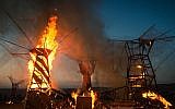 The art installation known as the 'Temple,' a giant, climbable structure built to resemble three trees, was burned at the end of Midburn in 2014 after more than 24 hours of negotiations with police. (Sharon Avraham/MIdburn)