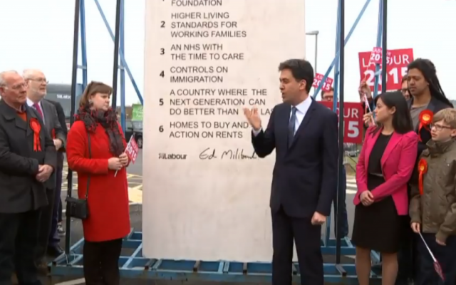 British Labour Party leader Ed Miliband stands in front of a monolith etched with his party's pledges ahead of the May 7, 2015 general elections. (screen capture: Daily Mail) British Labour Party leader Ed Miliband stands in front of a monolith etched with his party's pledges ahead of the May 7, 2015 general elections. (screen capture: Daily Mail)