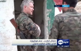 British actor Michael Enright (left), who joined the Syrian Kurdish YPG militia to fight the Islamic State, speaks to the UAE's Al-Aan TV (screen capture: YouTube)