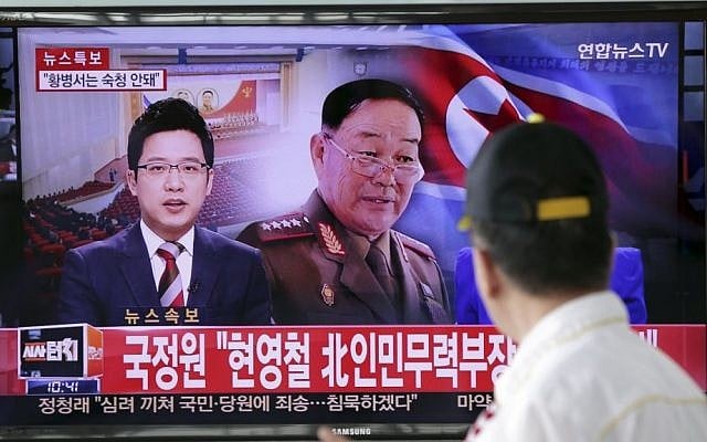 A man watches a TV news program reporting that North Korean People's Armed Forces Minister Hyon Yong Chol was killed by anti-aircraft gunfire, at Seoul Railway Station in Seoul, South Korea, Wednesday, May 13, 2015. (Photo credit: Lee Jin-man/AP) A man watches a TV news program reporting that North Korean People's Armed Forces Minister Hyon Yong Chol was killed by anti-aircraft gunfire, at Seoul Railway Station in Seoul, South Korea, Wednesday, May 13, 2015. (Photo credit: Lee Jin-man/AP)