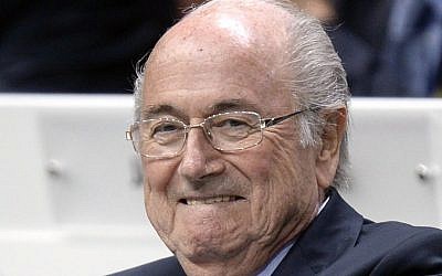 FIFA president Sepp Blatter smiles at the 65th FIFA Congress at the Hallenstadion in Zurich, Switzerland, Friday, May 29, 2015, where he was elected to a fifth term as FIFA boss (Walter Bieri/Keystone via AP)